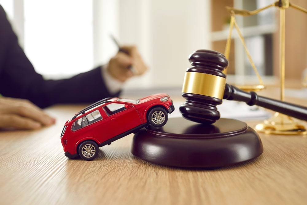 Red Toy Car And A Judges Gavel
